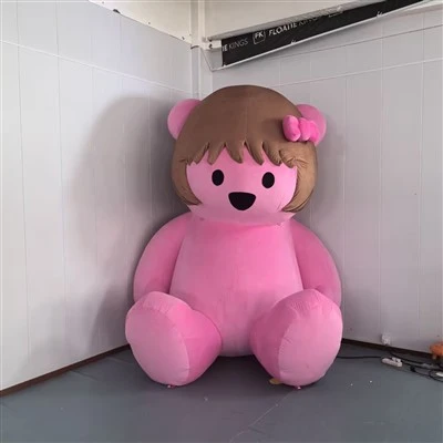 Bonic ós rosa inflable amb llaç